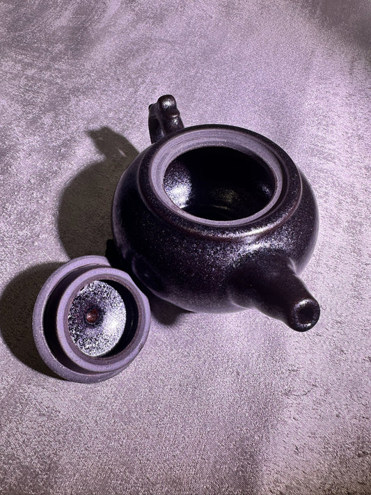 Black gold, ox-blood red glaze, silver snow flake pattern teapot