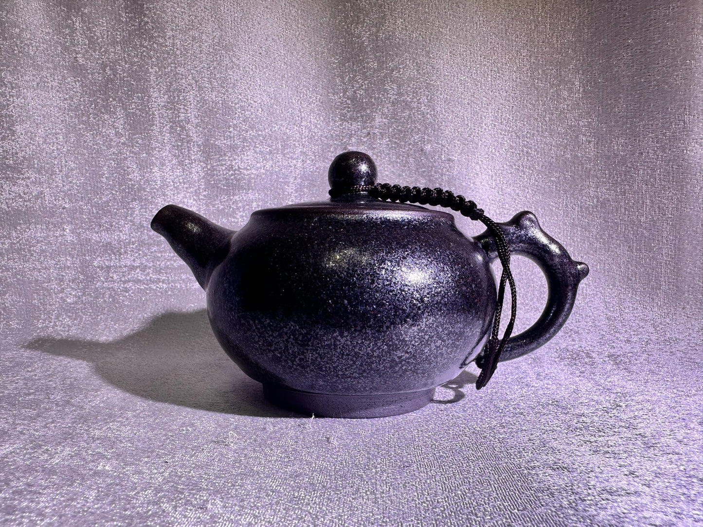 Black gold, ox-blood red glaze, silver snow flake pattern teapot