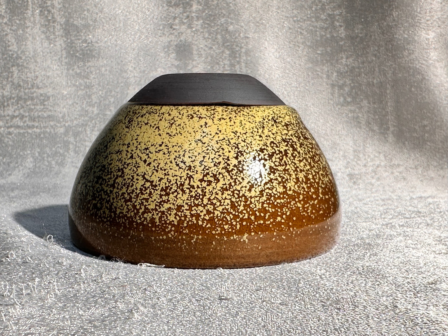 Cup1-Brown jade-like glaze daisy oil droplets pattern ice crackles monk bowl shape cup 古潭花 by WangZhangLiang