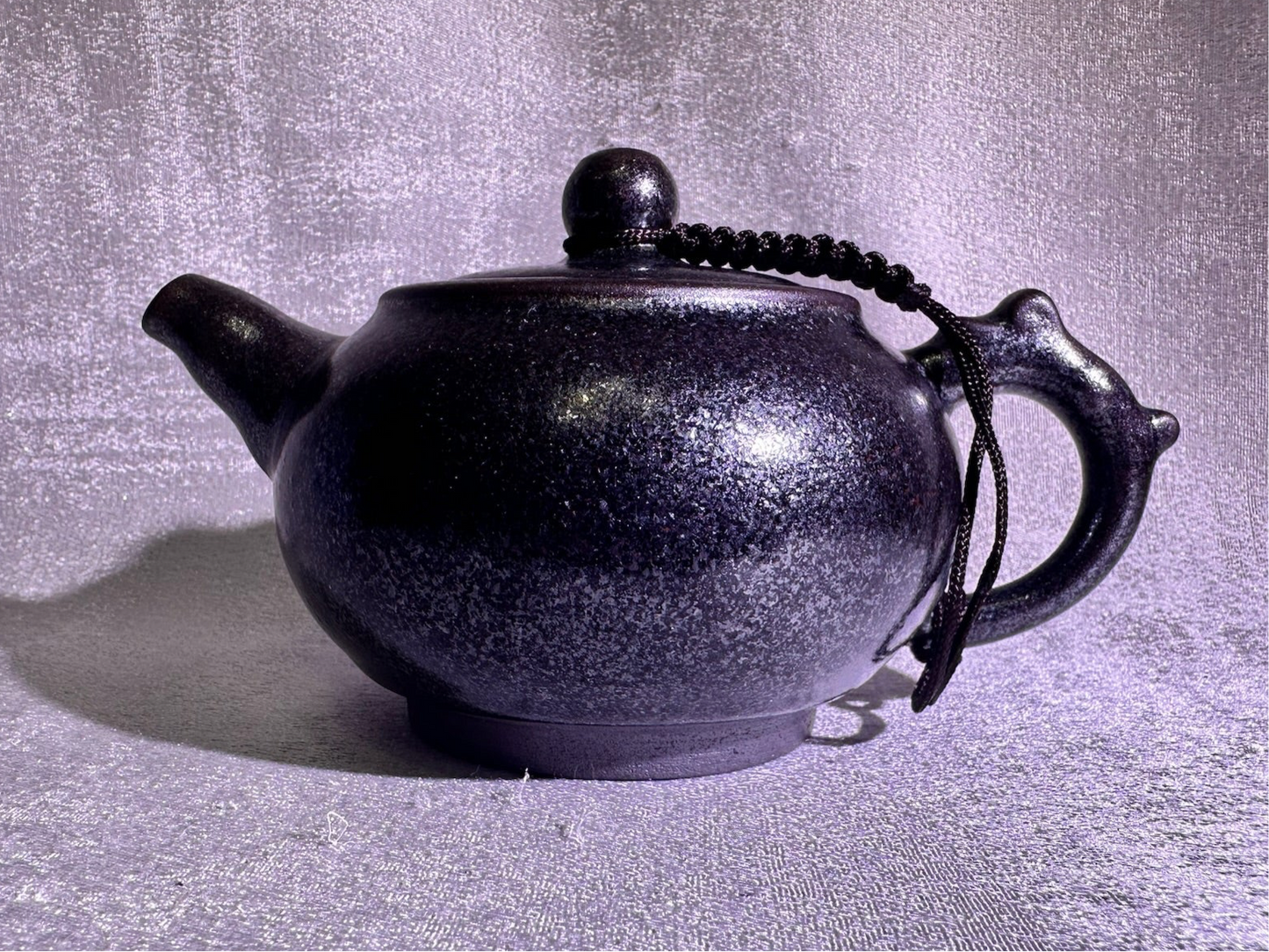Black gold, ox-blood red glaze, silver snow flake pattern teapot