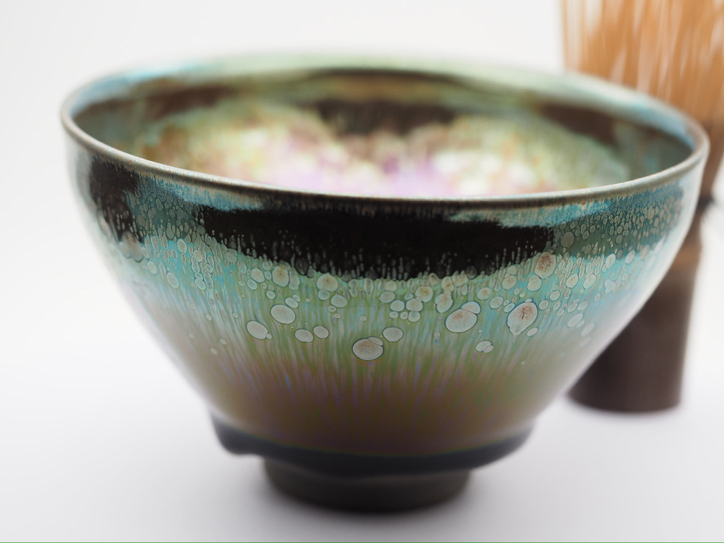 Multi color galaxy-like yohen glaze tied mouth Diancha tea bowl with one glaze tear drop