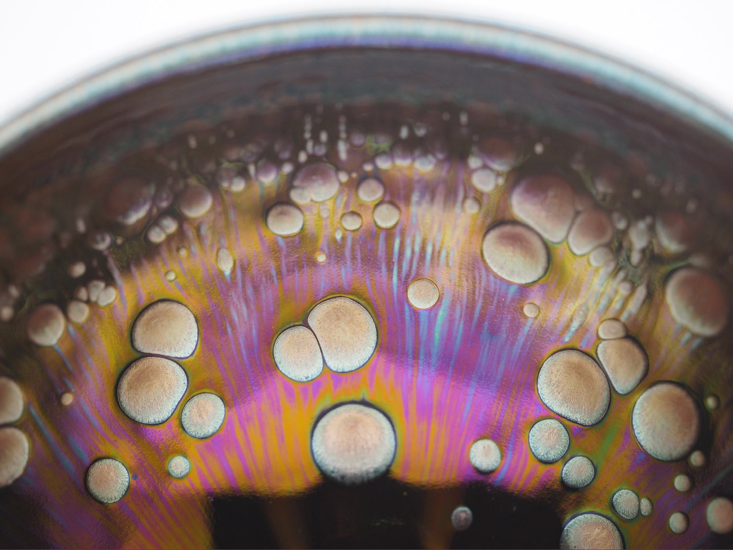 Multi color galaxy-like yohen glaze tied mouth Diancha tea bowl with one glaze tear drop