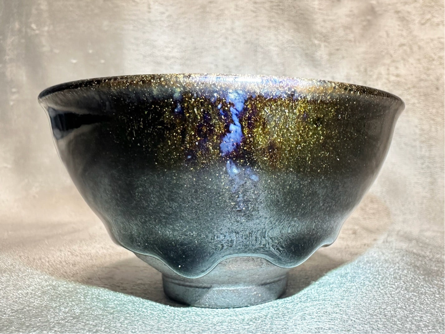 Black glaze kiln transformed golden sands blue hare’s fur pattern tied mouth shape cup with glaze tears, drippy
