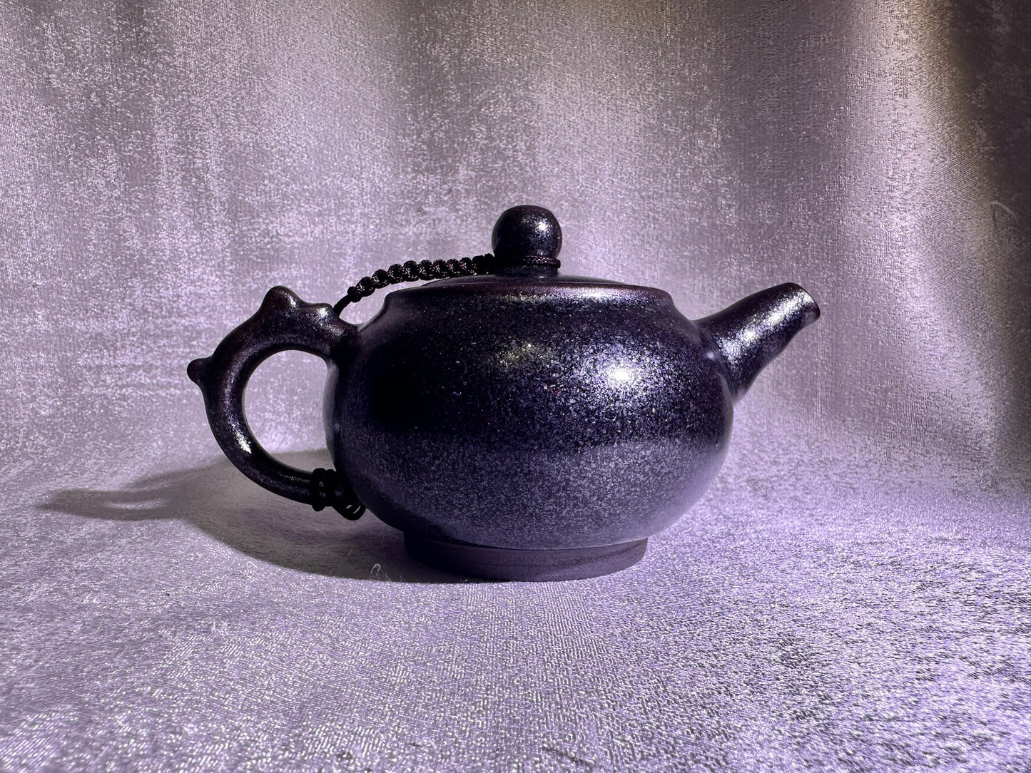 Black gold, ox-blood red glaze, silver snow flake pattern teapot
