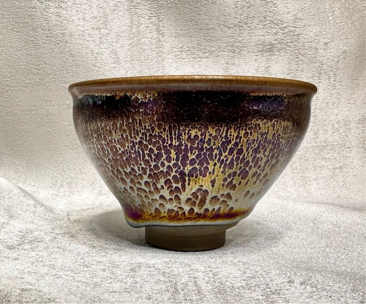 Black glaze purple color oil droplet pattern tied mouth shape cup with one glaze tear, HuangJie
