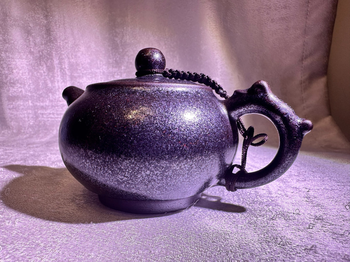Black gold, ox-blood red glaze, silver snow flake pattern teapot