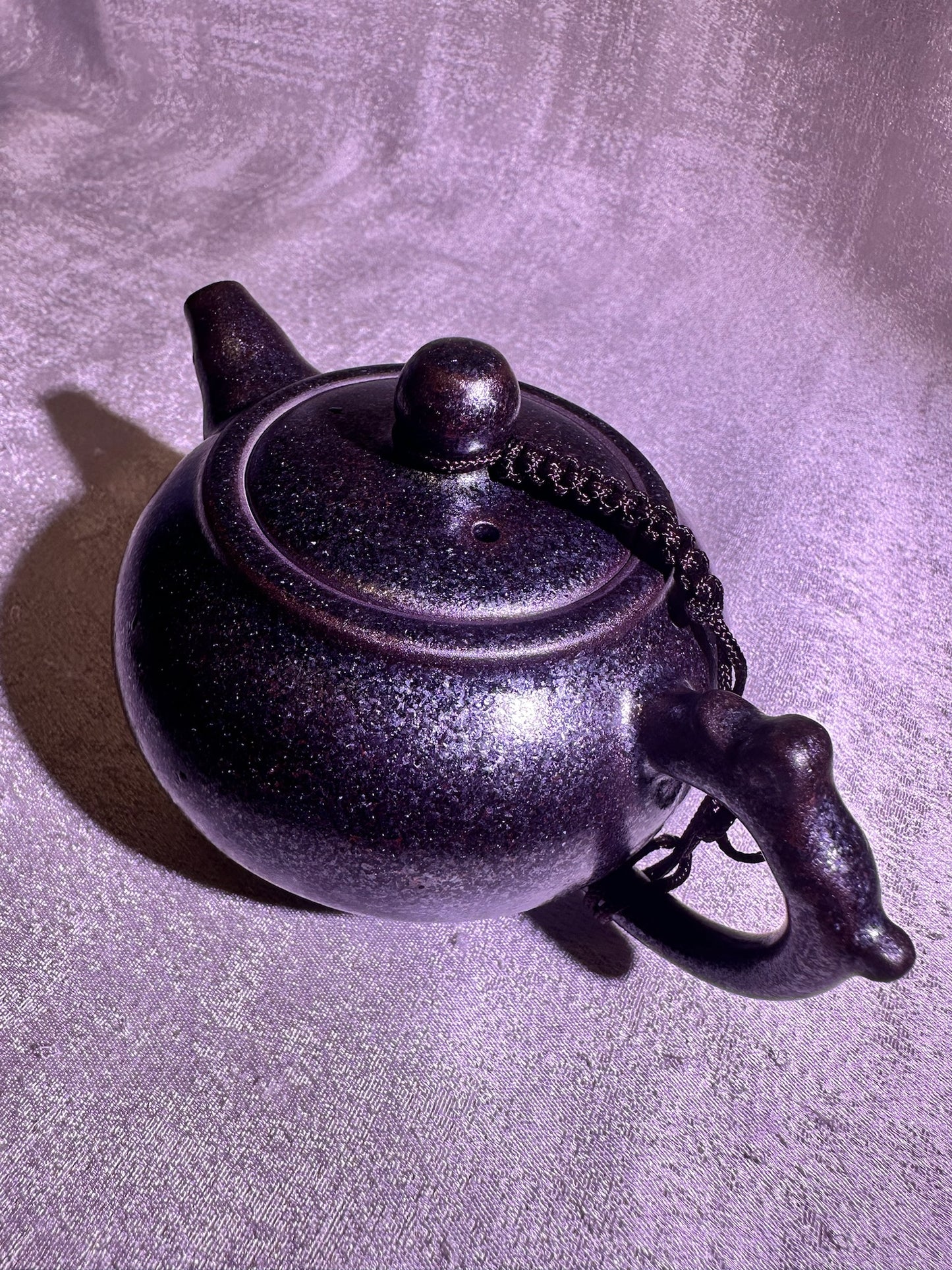 Black gold, ox-blood red glaze, silver snow flake pattern teapot