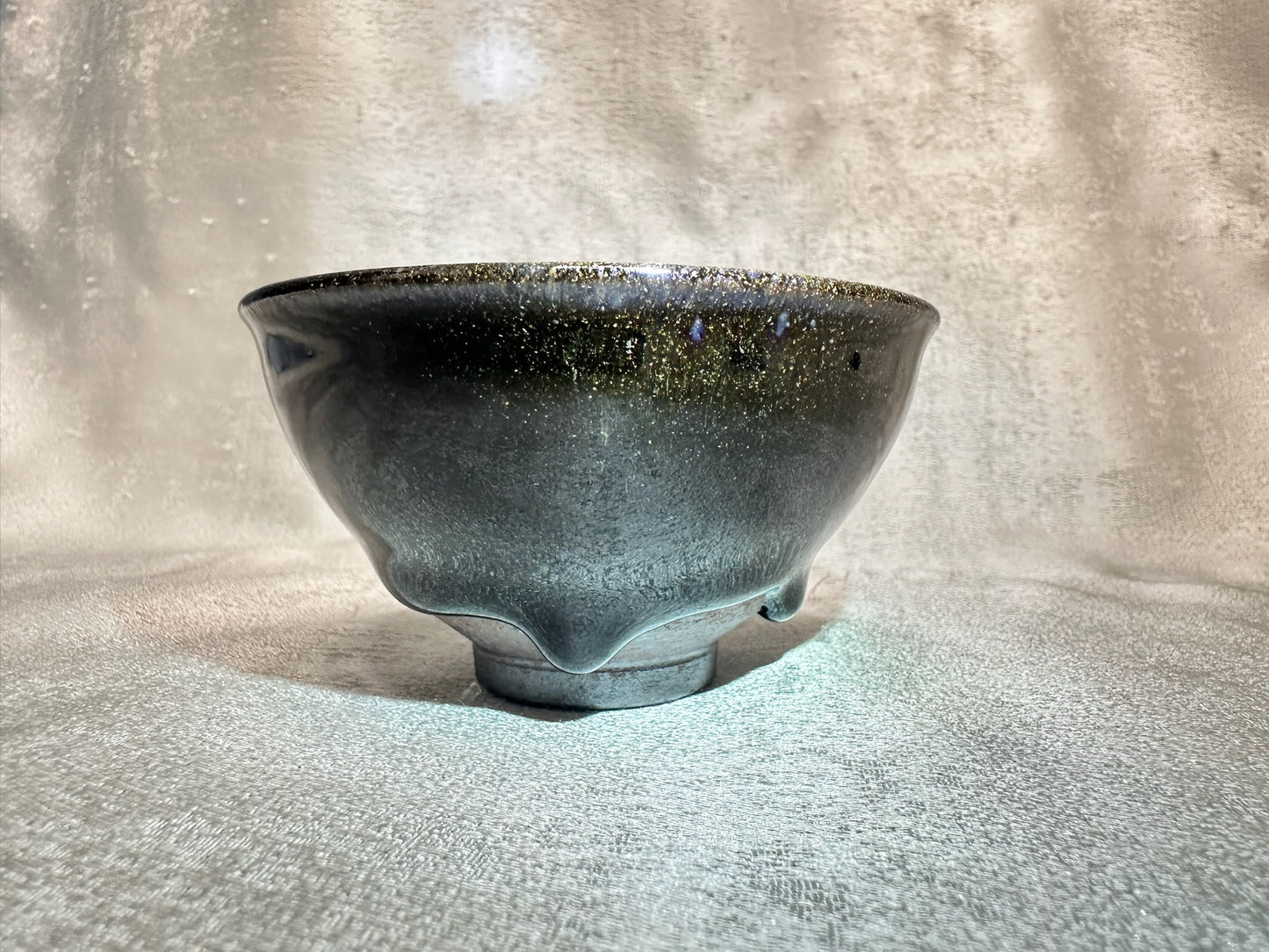 Black glaze kiln transformed golden sands blue hare’s fur pattern tied mouth shape cup with glaze tears, drippy