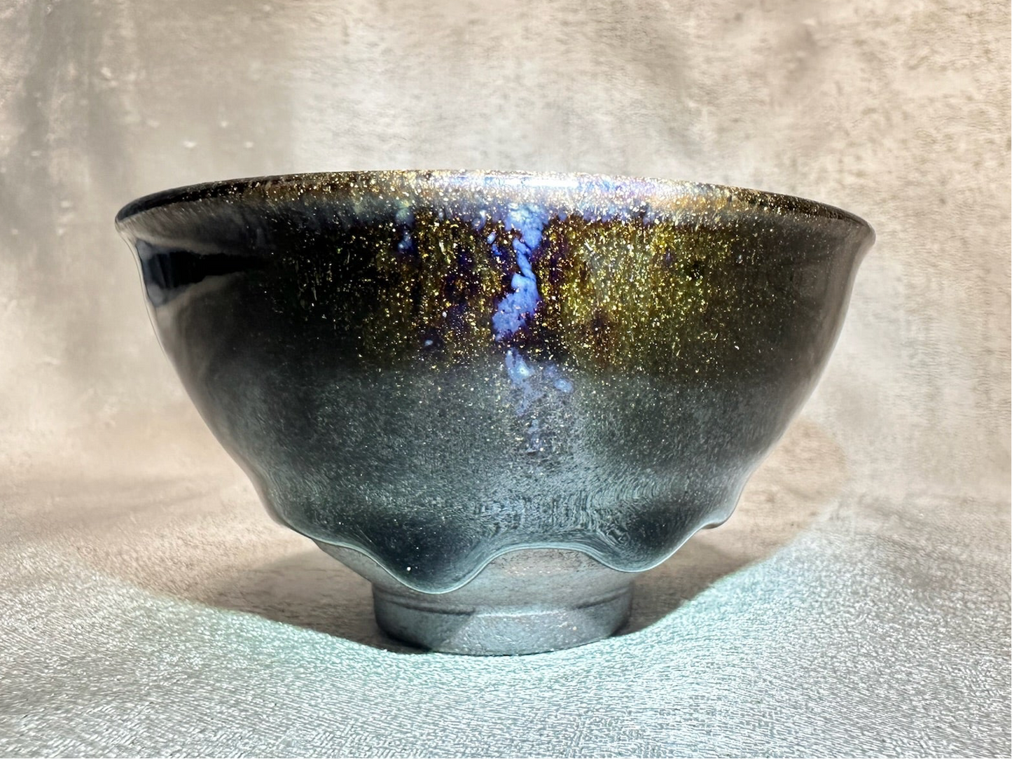 Black glaze kiln transformed golden sands blue hare’s fur pattern tied mouth shape cup with glaze tears, drippy