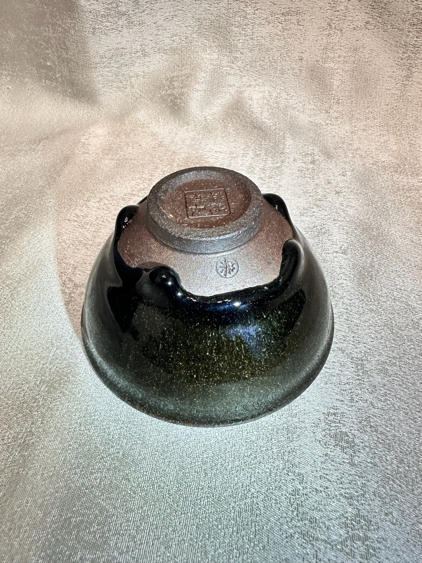 Black glaze kiln transformed golden sands blue hare’s fur pattern tied mouth shape cup with glaze tears, drippy