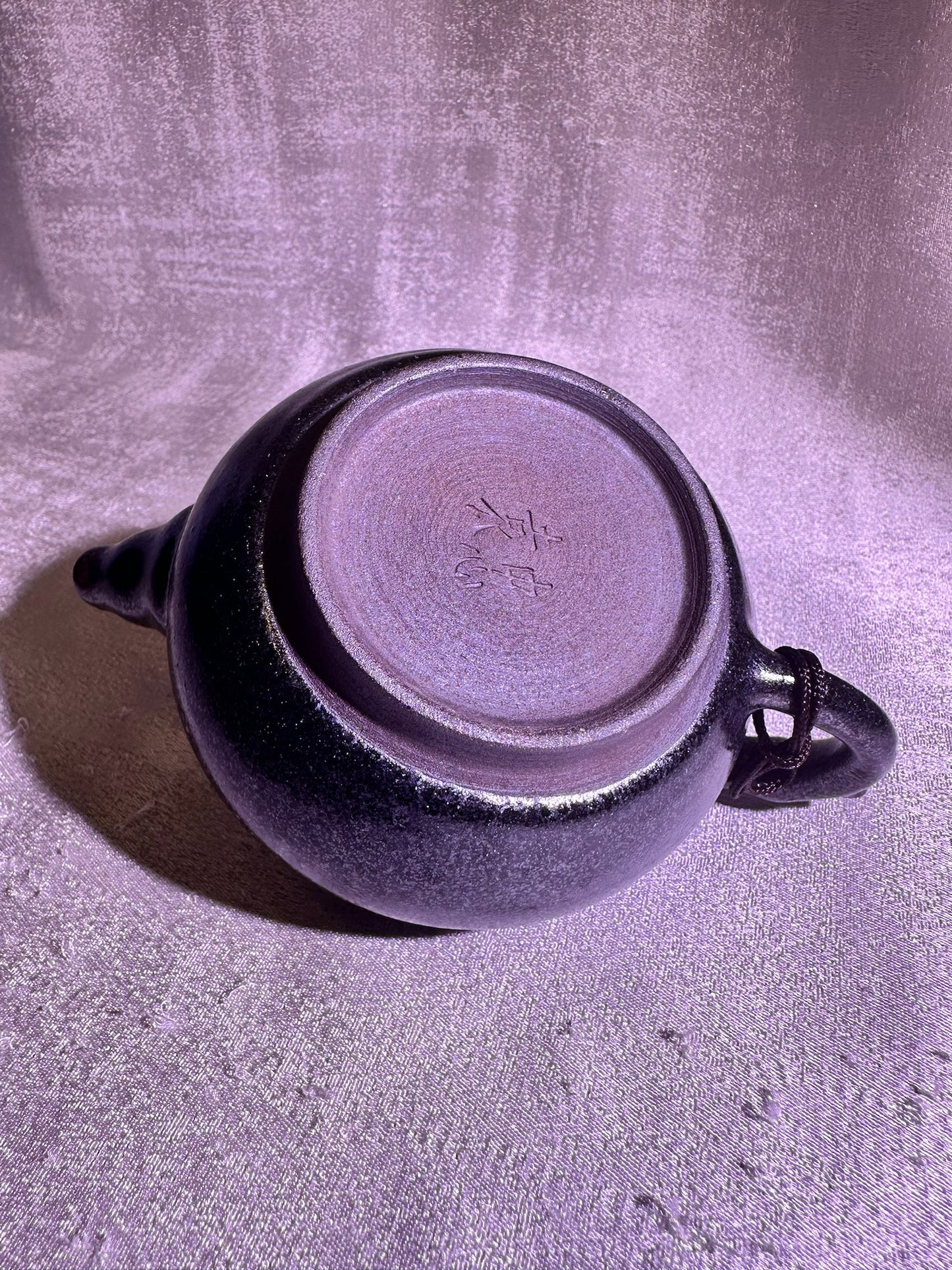 Black gold, ox-blood red glaze, silver snow flake pattern teapot