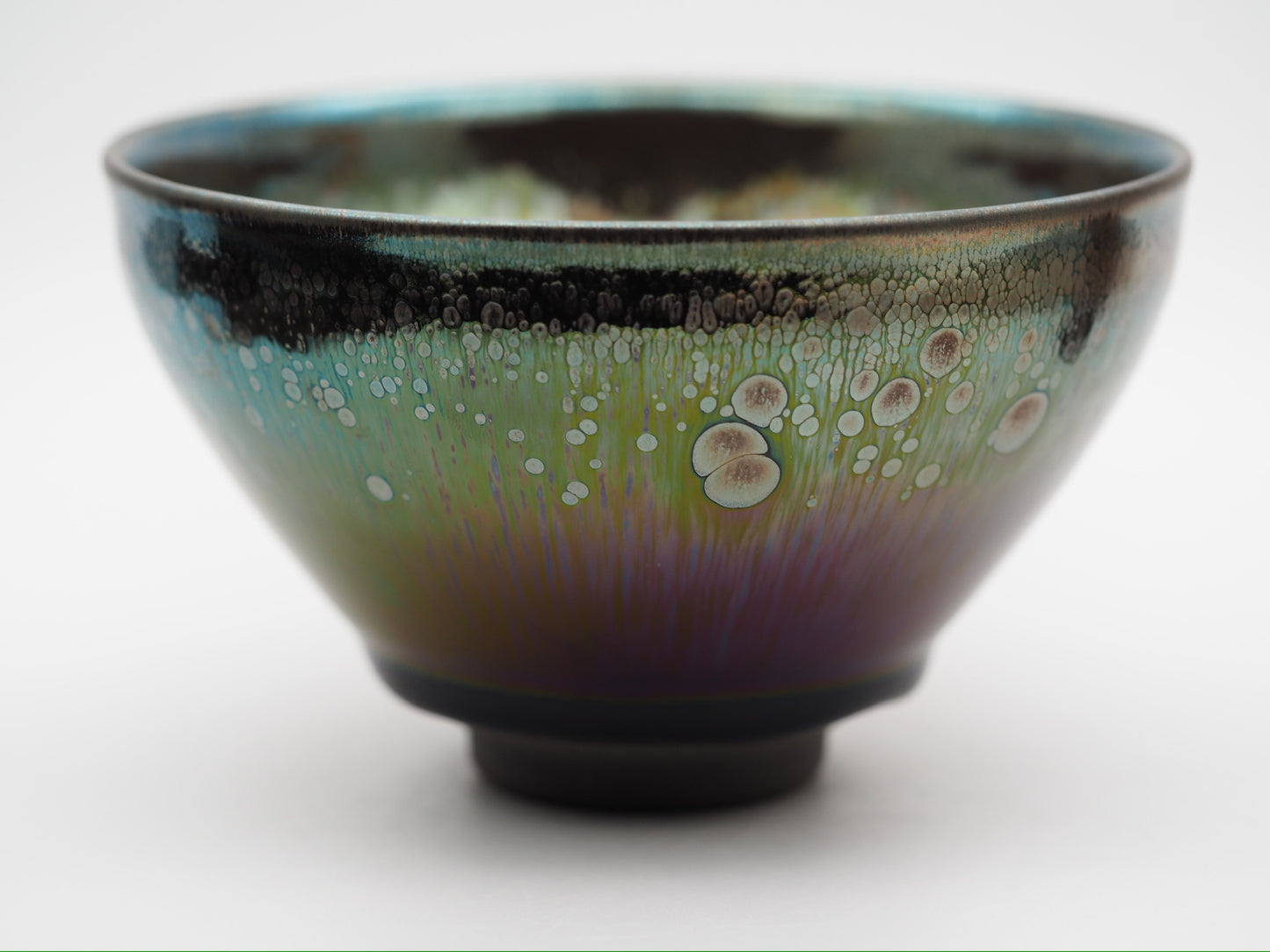 Multi color galaxy-like yohen glaze tied mouth Diancha tea bowl with one glaze tear drop