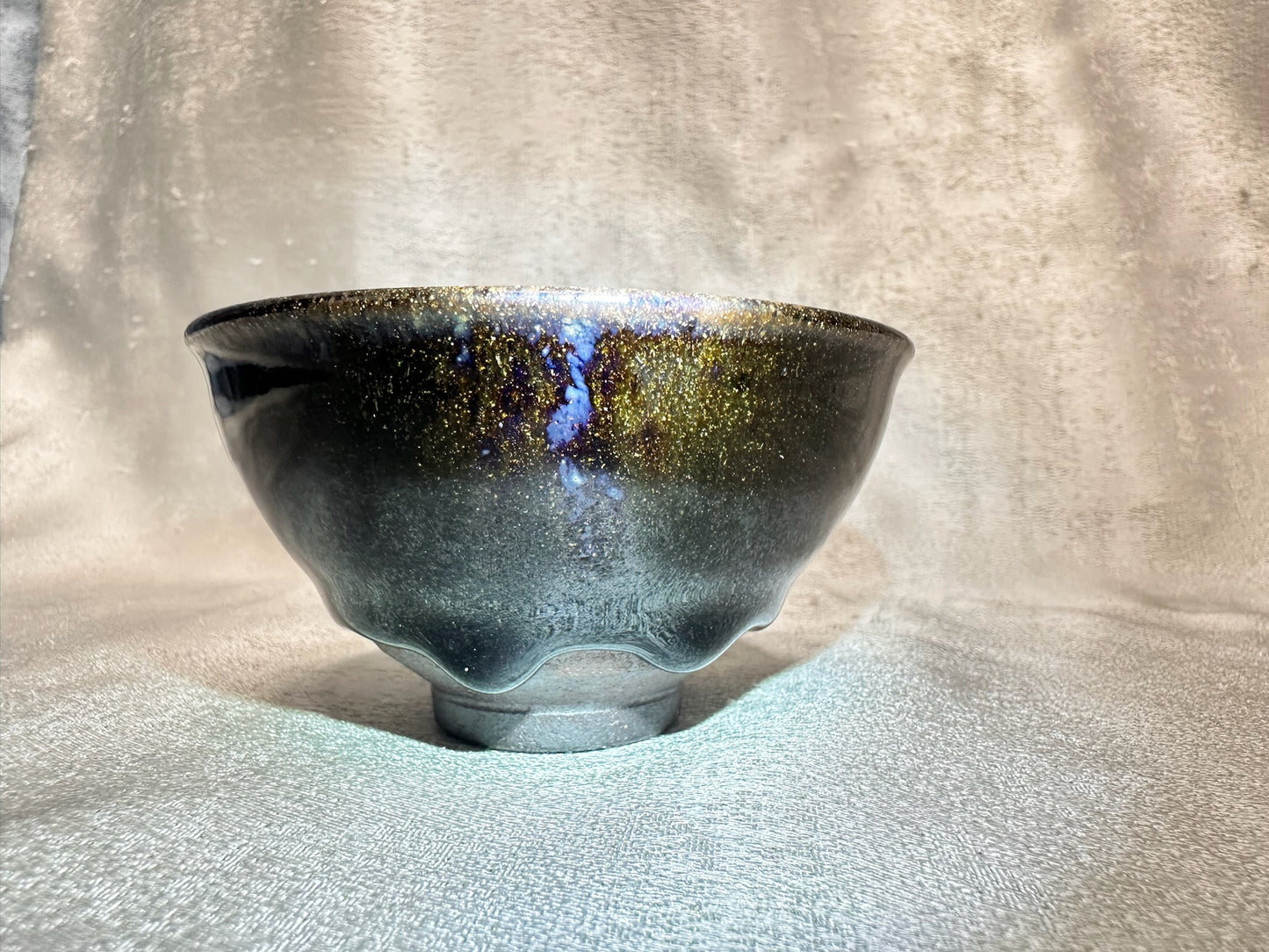 Black glaze kiln transformed golden sands blue hare’s fur pattern tied mouth shape cup with glaze tears, drippy