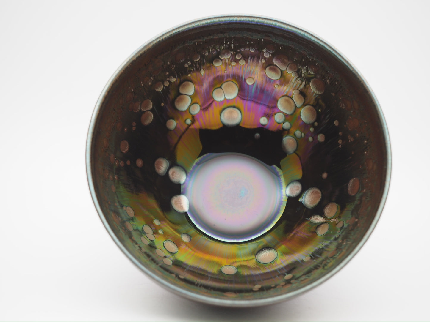 Multi color galaxy-like yohen glaze tied mouth Diancha tea bowl with one glaze tear drop