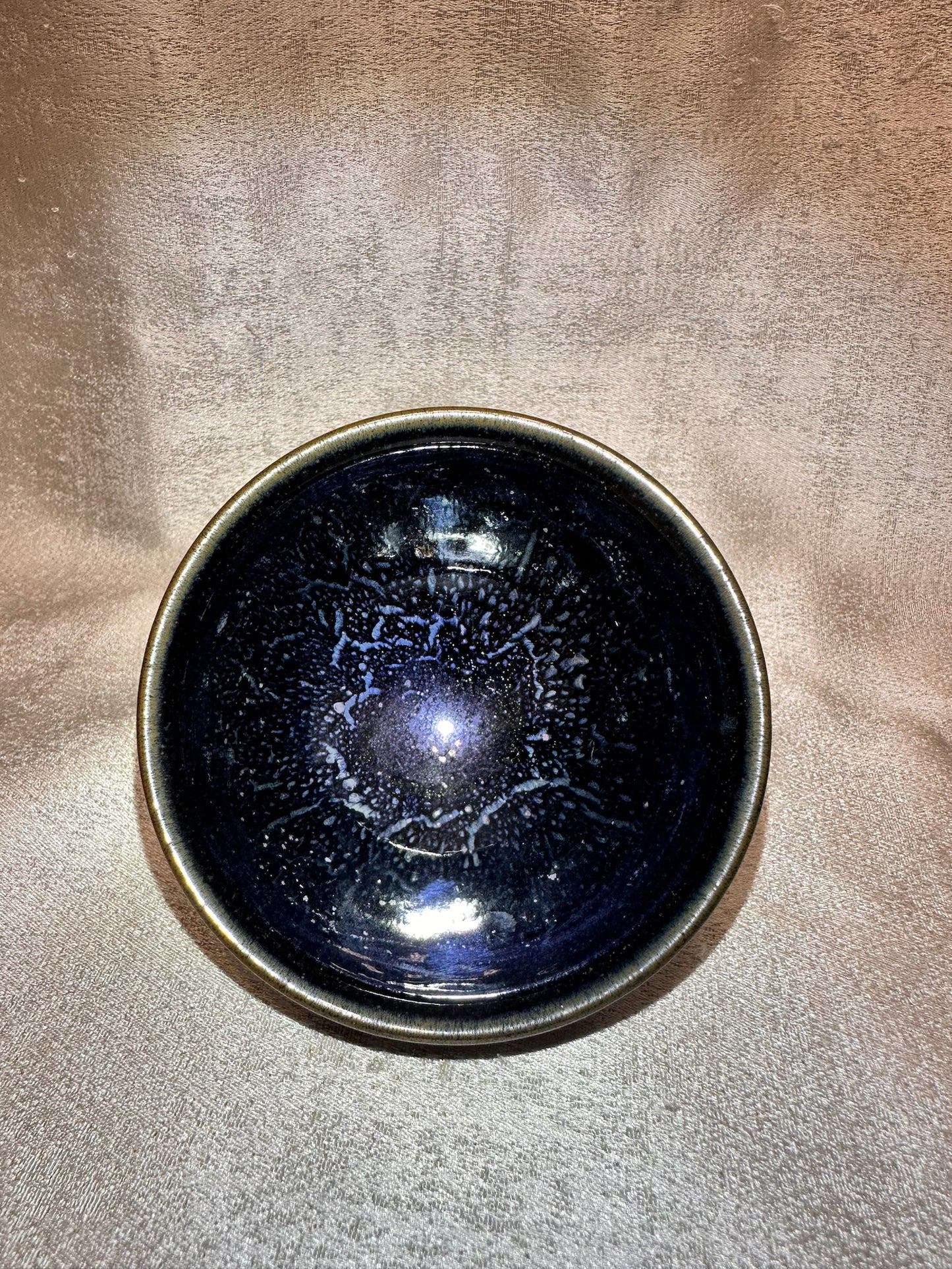 Golden rim black glaze blue rain drops kiln transformed pattern tied mouth shape black ceramic Jianzhan cup