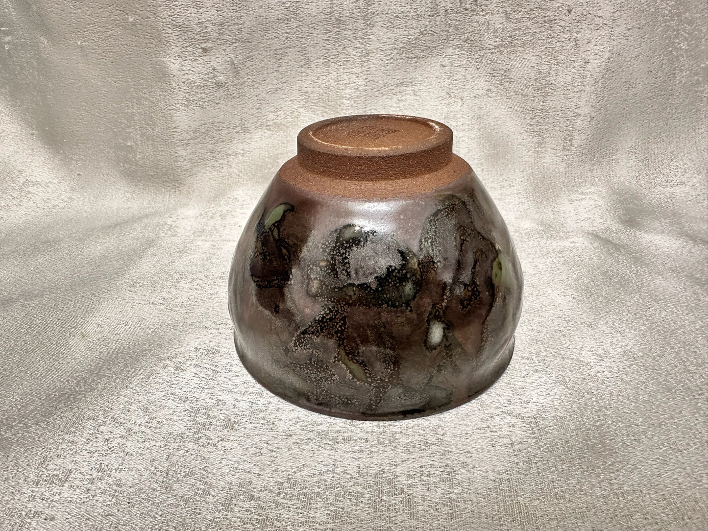 Brown glaze kiln transformed jade-like green and white mountain river scenery tied mouth shape cup