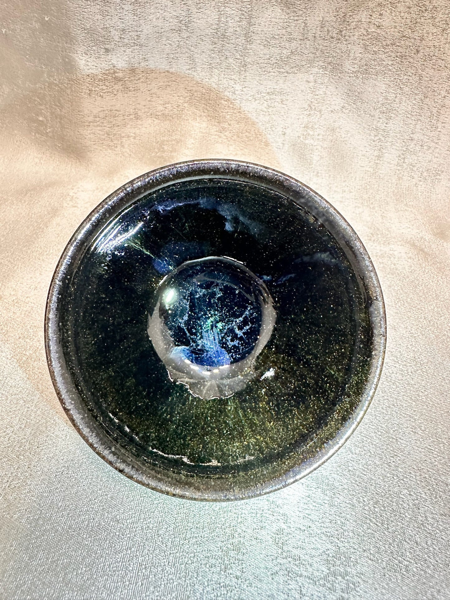 Black glaze kiln transformed golden sands blue hare’s fur pattern tied mouth shape cup with glaze tears, drippy