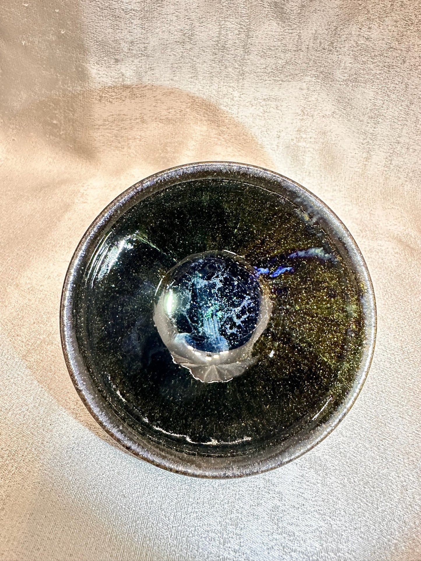 Black glaze kiln transformed golden sands blue hare’s fur pattern tied mouth shape cup with glaze tears, drippy