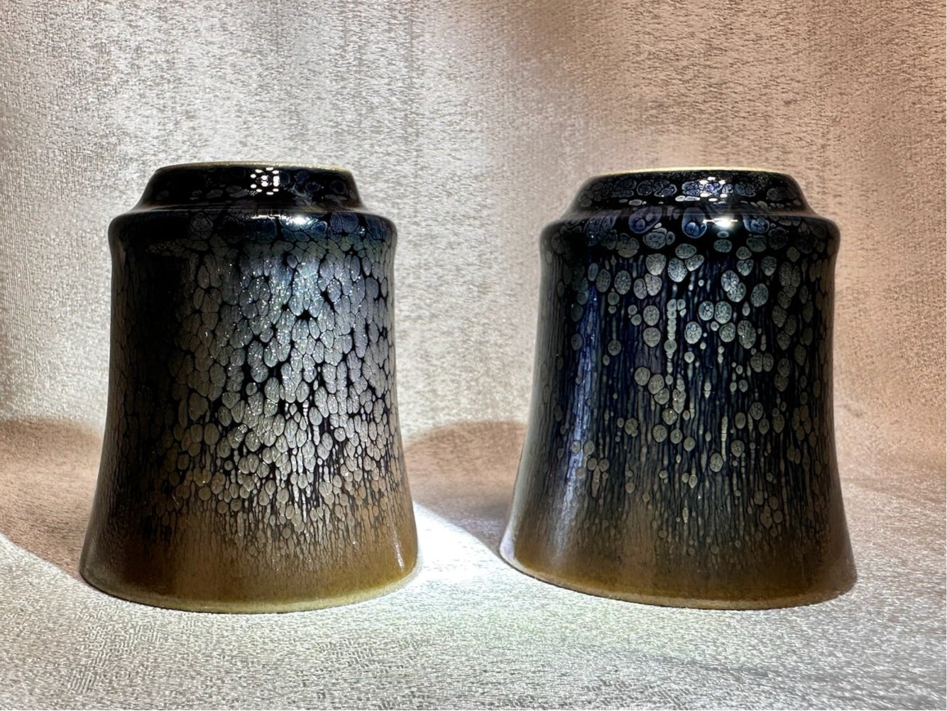 Double sided glaze, interior jade-like glaze exterior black glaze silver oil droplet sake wine cup set