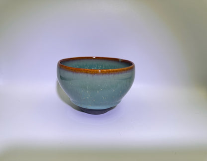 Lake green glaze light blue hare’s fur yellow daisy-like oil droplet pattern monk bowl shape cup