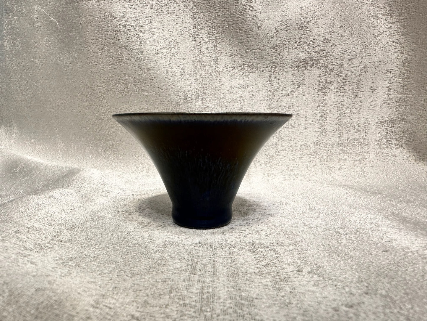 Super thin iron-rich clay body, obsidian glaze black hare’s fur flared mouth shape cup
